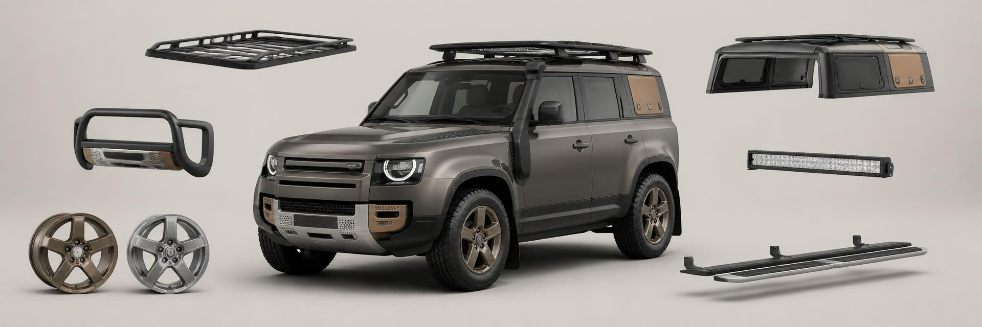 Land Rover Defender accessories montage banner showing bull bars, roof racks, canopies, wheels, light bars and side steps — from www.defender-accessories.com
