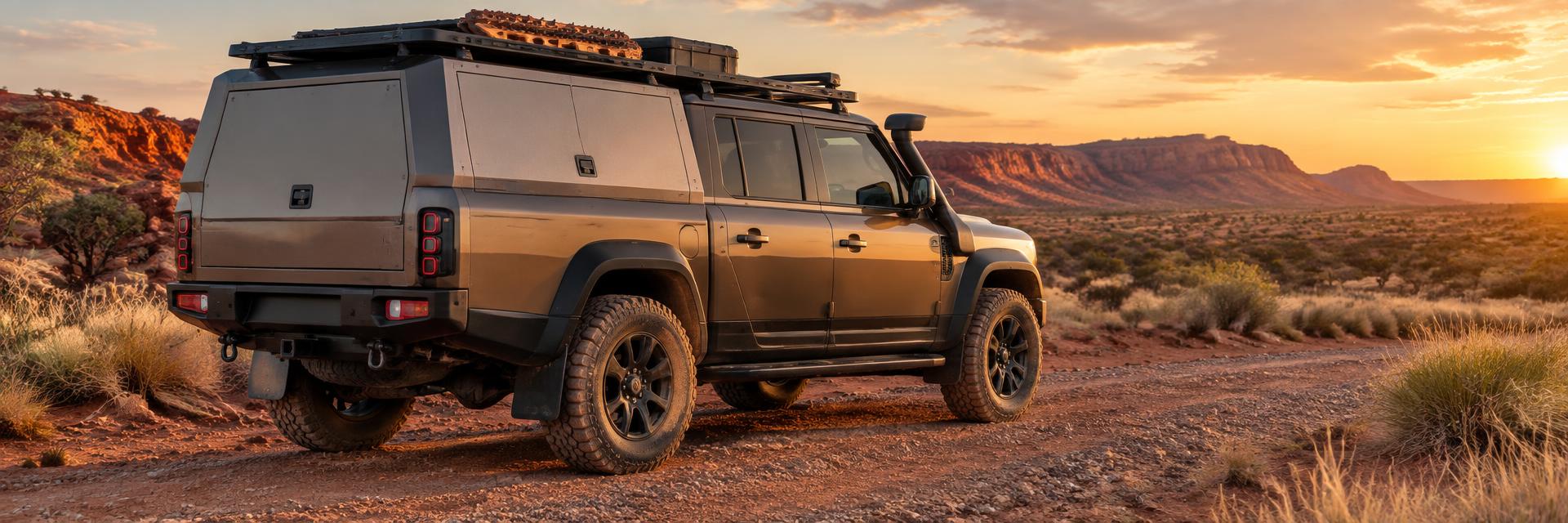 Bronze NEW Defender 130 UTE concept with aluminium touring canopy in the Australian outback on www.defender-accessories.com